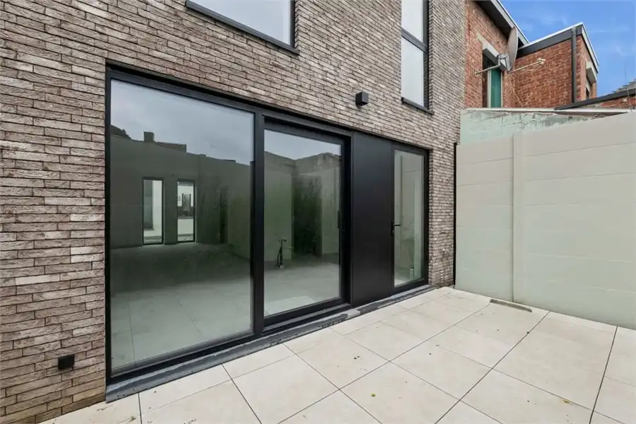 KNAPPE NIEUWBOUWWONING IN HET CENTRUM VAN BORGLOON (MOGELIJKHEID AANKOOP 6% BTW) foto 11