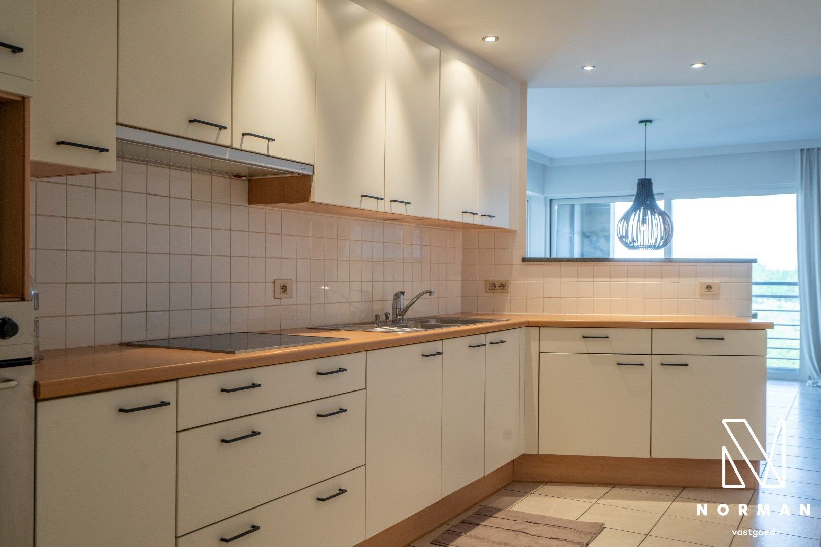 Ruim appartement met 2 slaapkamers, ondergrondse garage en prachtig zicht op de Leie foto 8