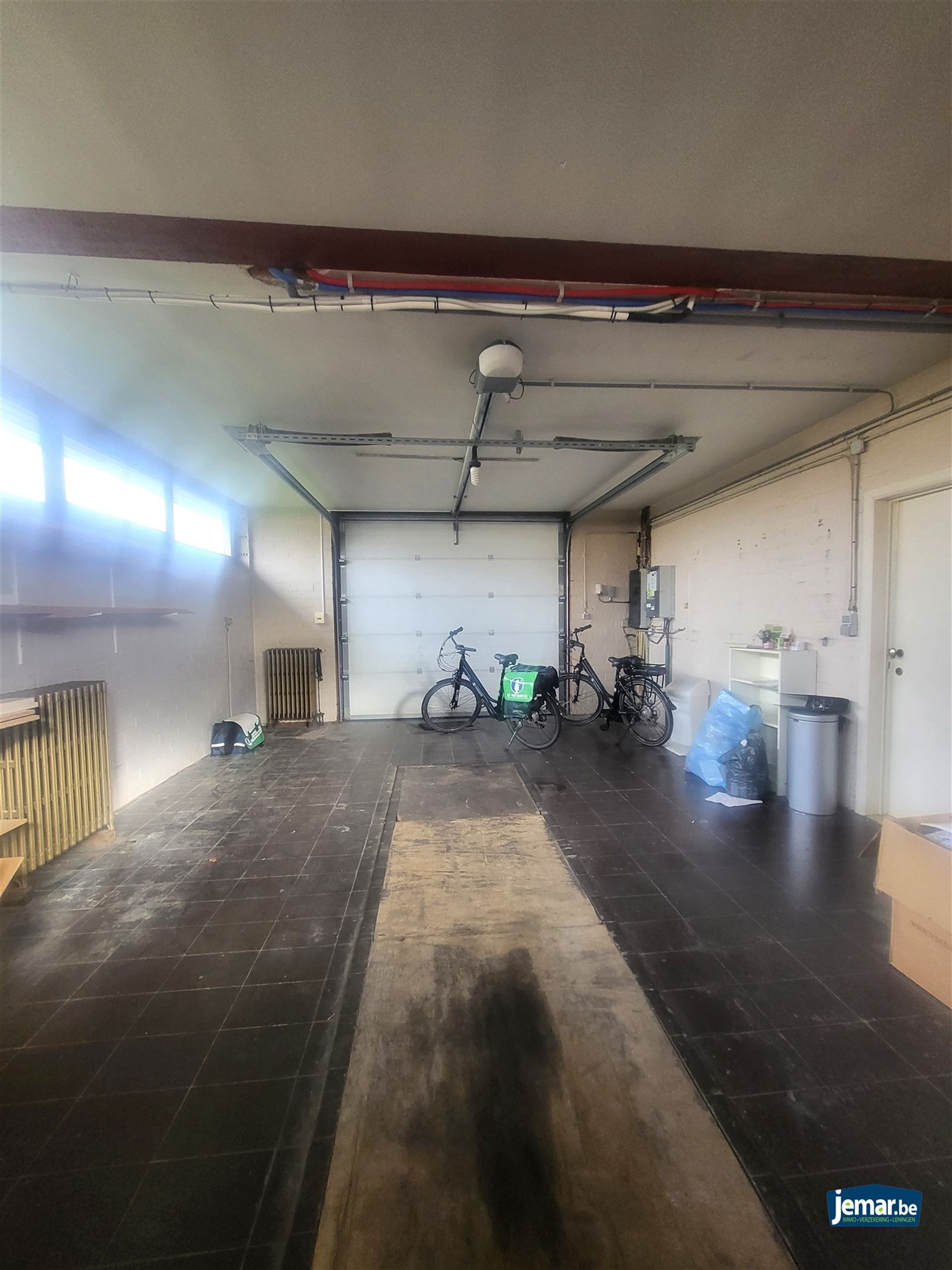 Handelsruimte met woonst foto 18