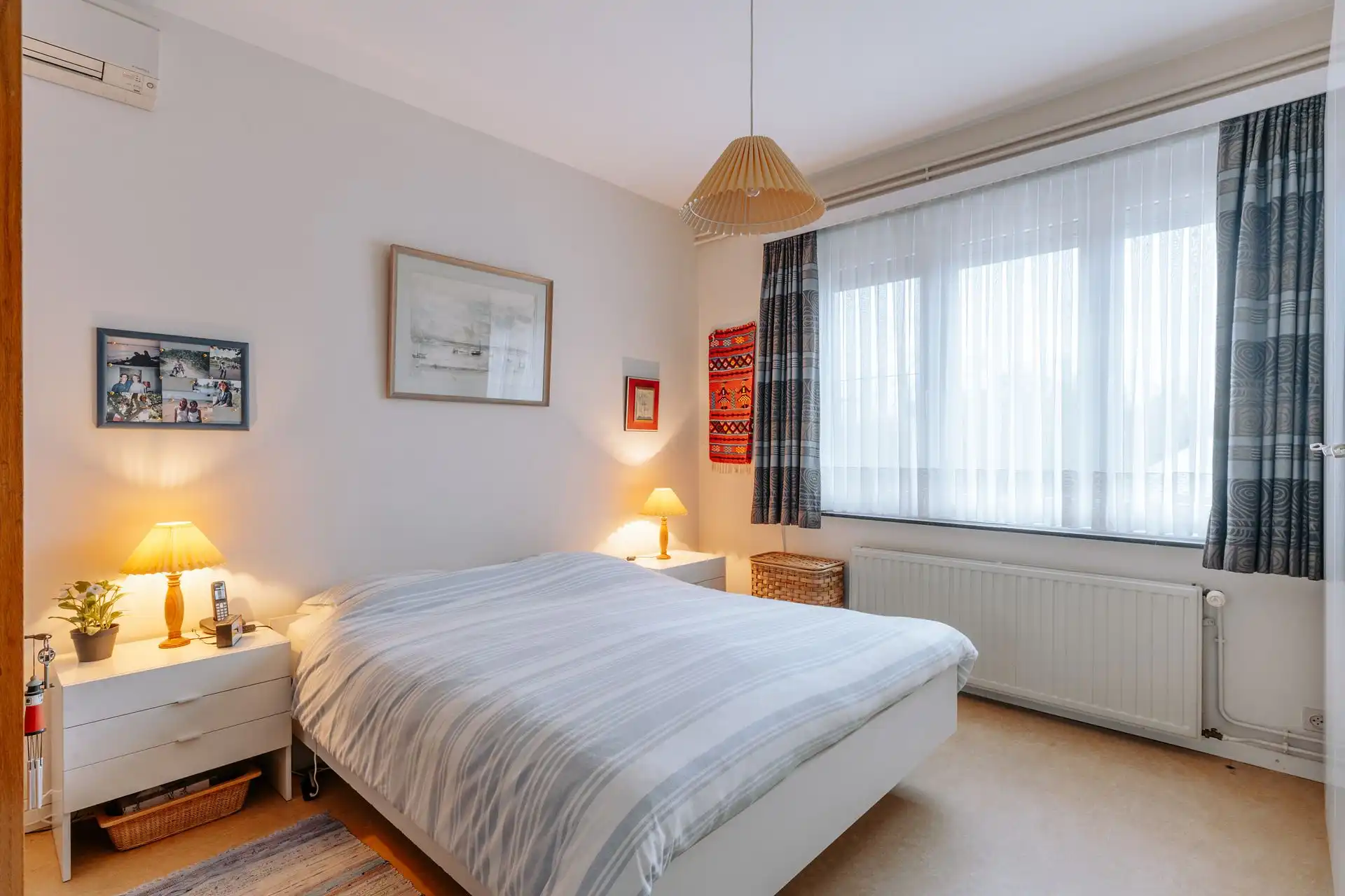 Ruim 3-slaapkamerappartement met karakter en autostaanplaats foto 12