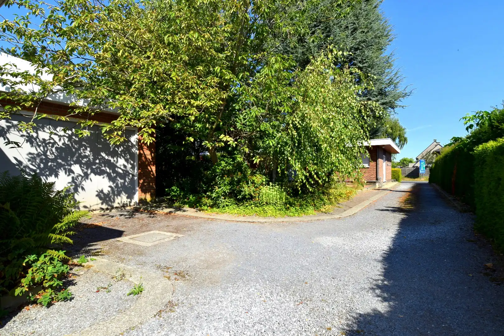 Alleenstaande woning met achterliggende opslag ruimte (205 m²) te koop in Heule foto 19