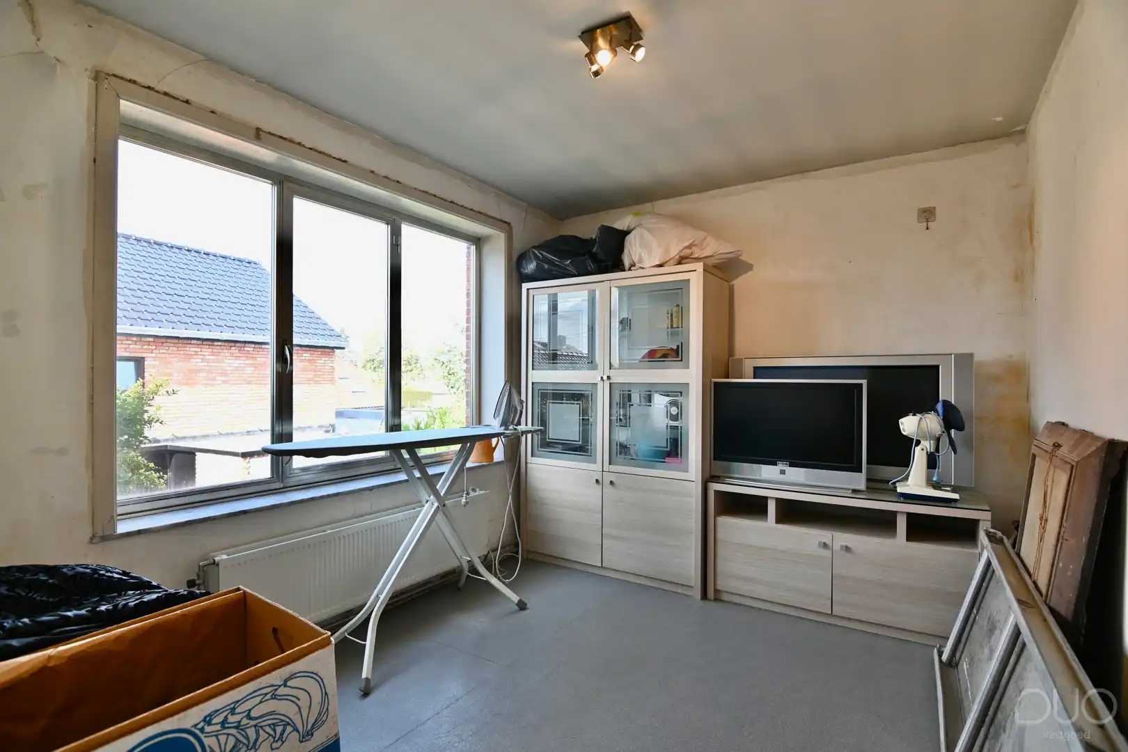 Ruim pand - makkelijk op te delen in 2 appartementen en grote tuin in het centrum van Zepperen foto 21
