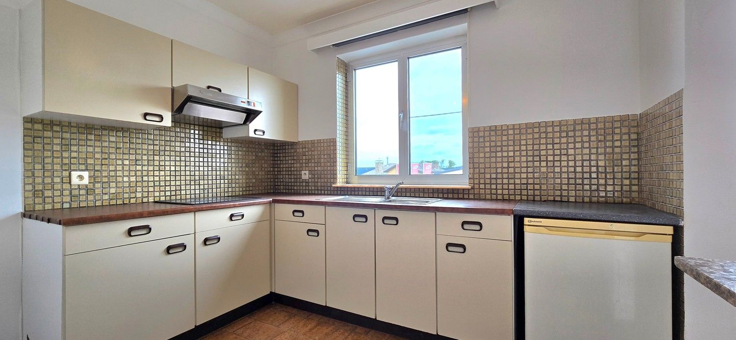 Instapklaar 2-slaapkamer appartement met garage, autostaanplaats en kelderberging foto 5