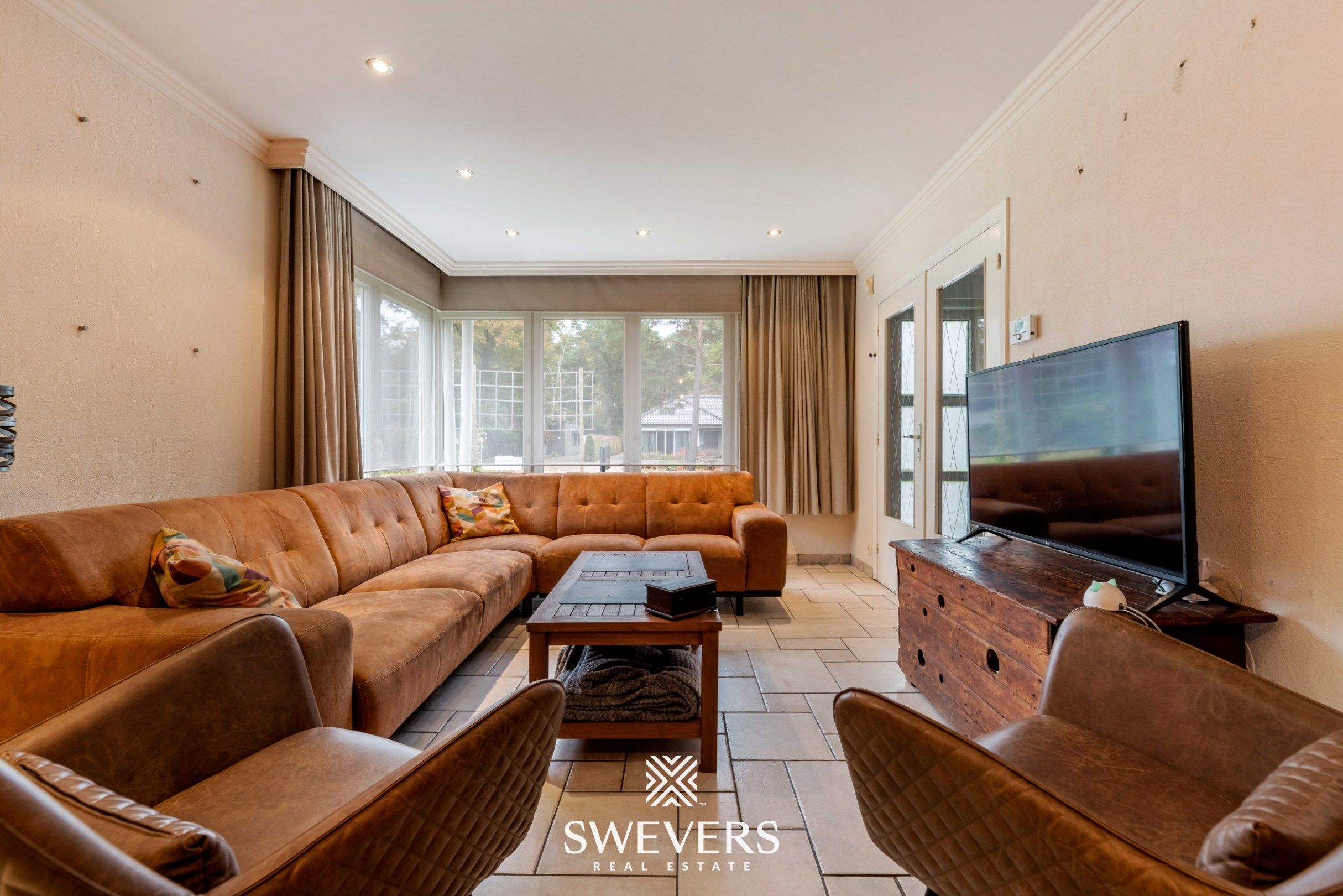 Instapklare gezinswoning met 3 slaapkamers, ruime kelder en zuidgerichte tuin in Beringen foto 6