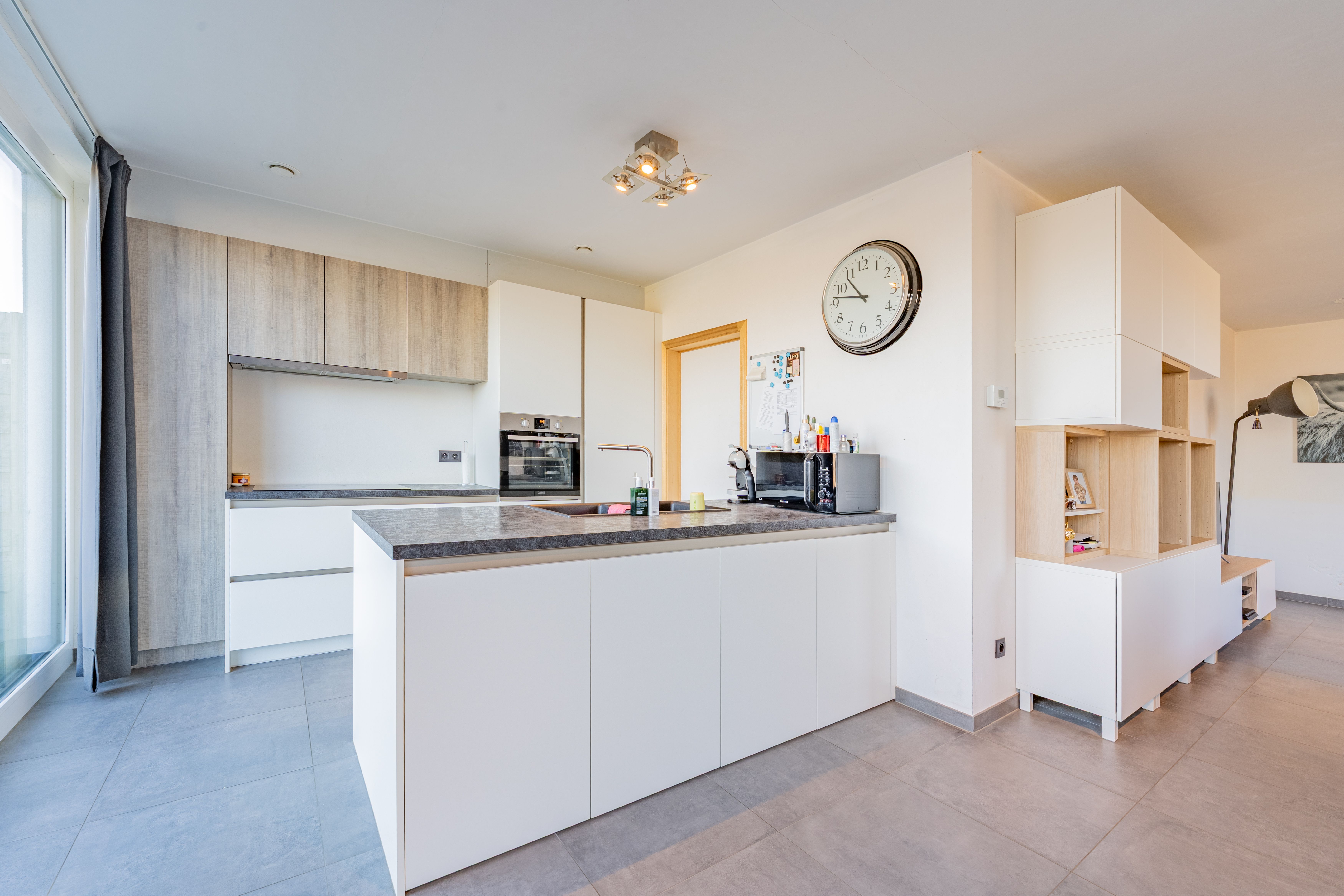 Halfopen bebouwing met inpandige garage en ruime tuin foto 4