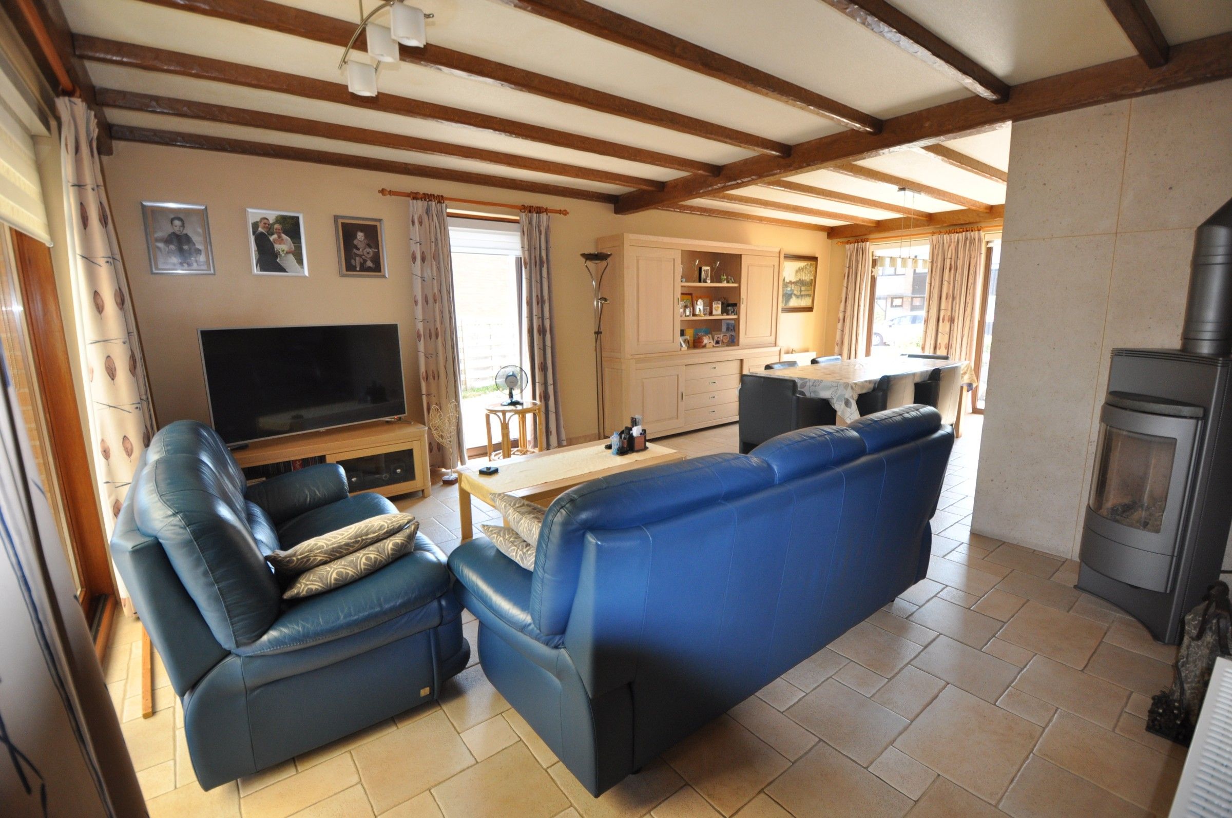 Ruime verzorgde woning met grote tuin en garage ! foto 6