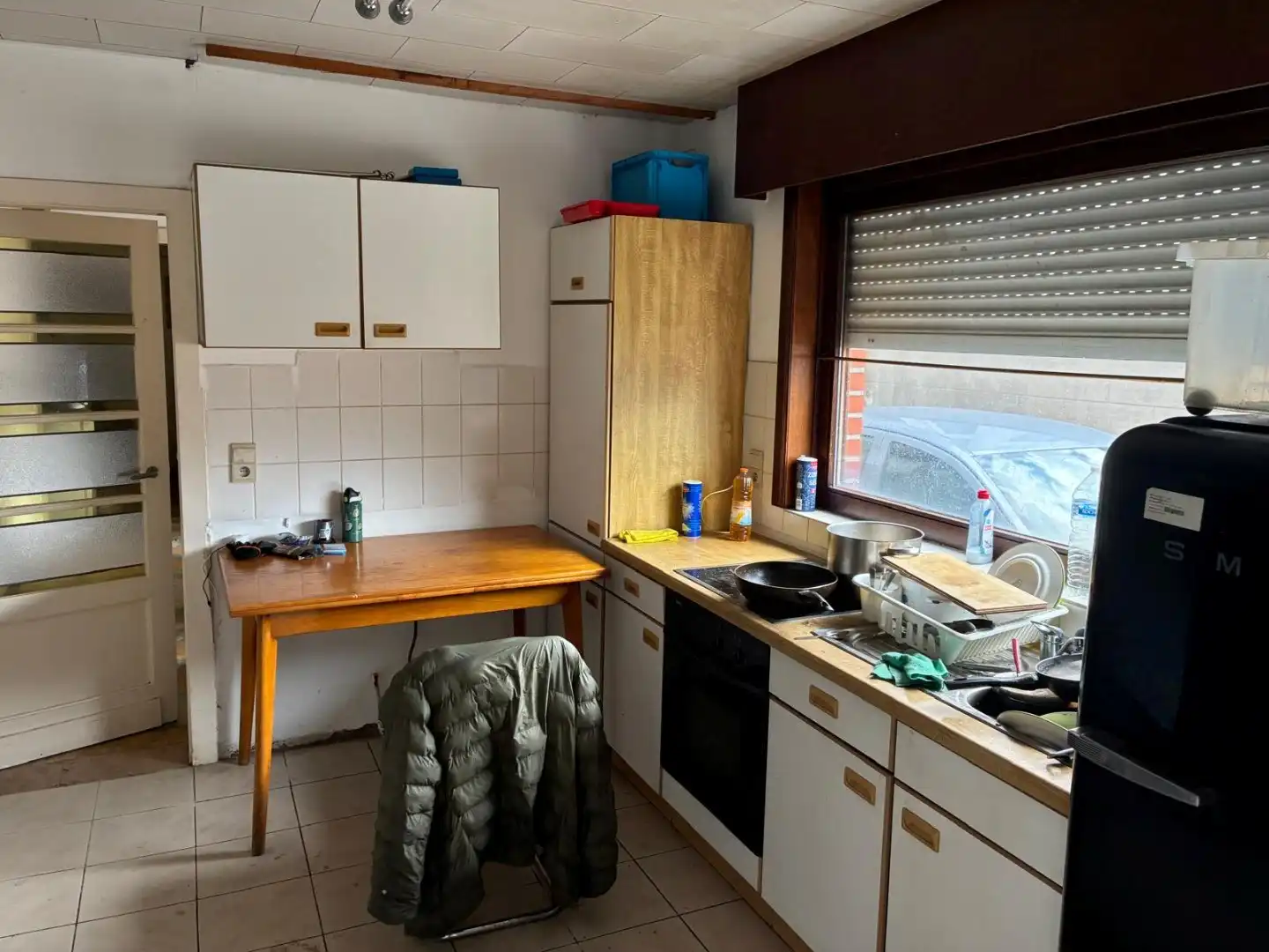 Te renoveren woning met magazijn en inrijpoort foto 8