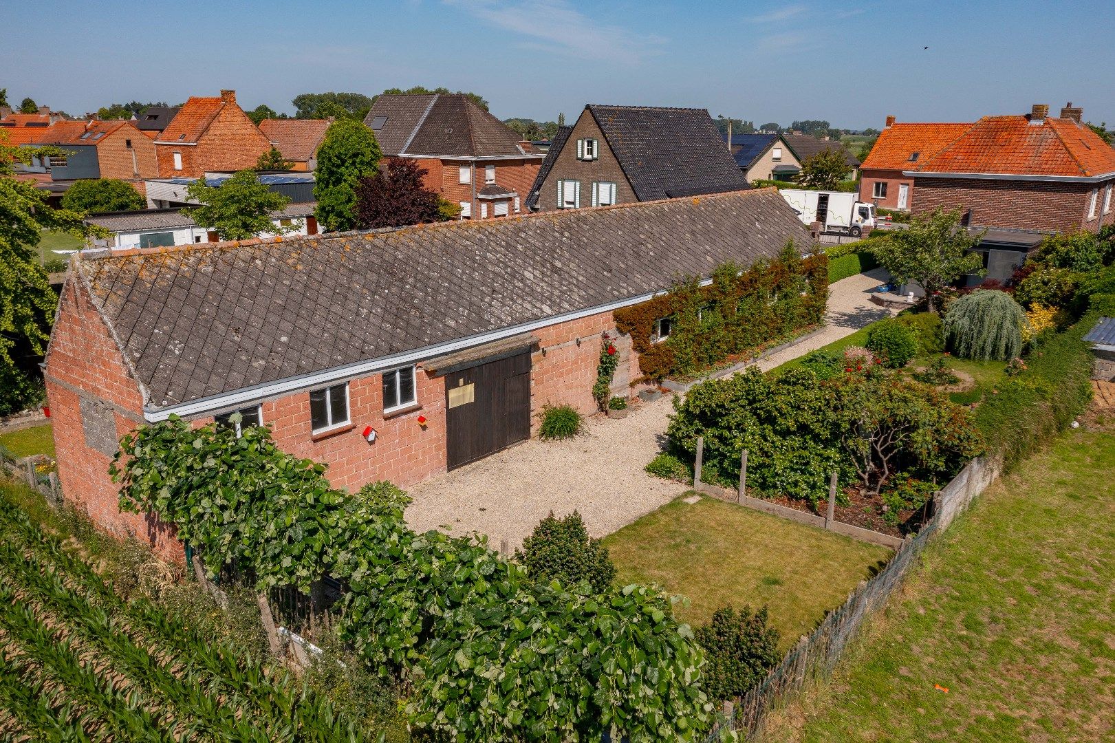 KARAKTERVOLLE WOONST MET BIJGEBOUW (140 m²) EN PRACHTIG VERZICHT!!!  foto 2