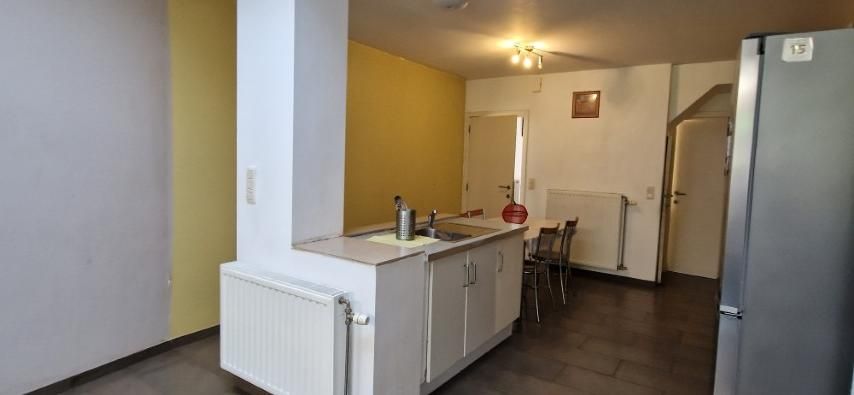 Gerenoveerde EENGEZINSWONING op 2 are 55 a met tuin( z) en parking foto 9