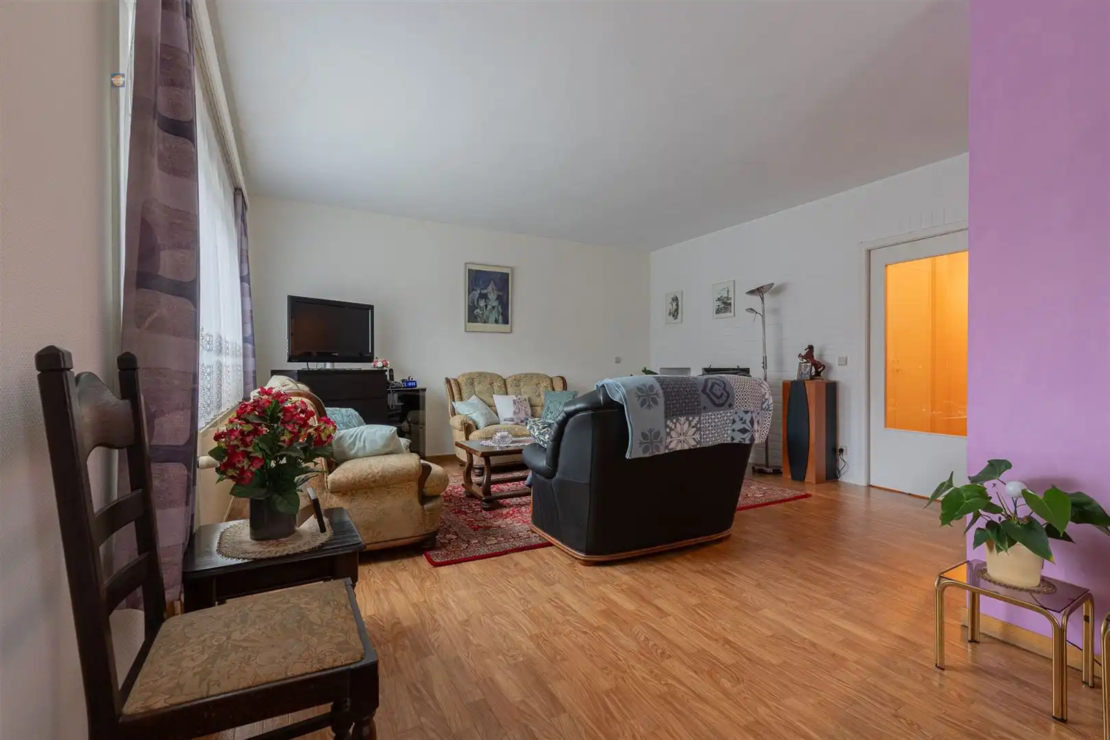 Gelijkvloers 2-slaapkamerappartement met tuin en garage foto 3