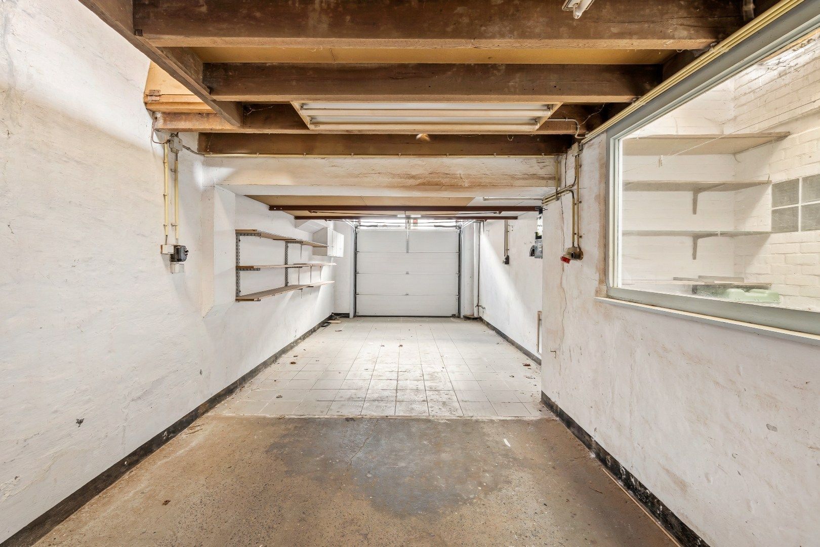 Gezellige stadswoning met 4 slaapkamers, ruime garage en koertje. foto 4