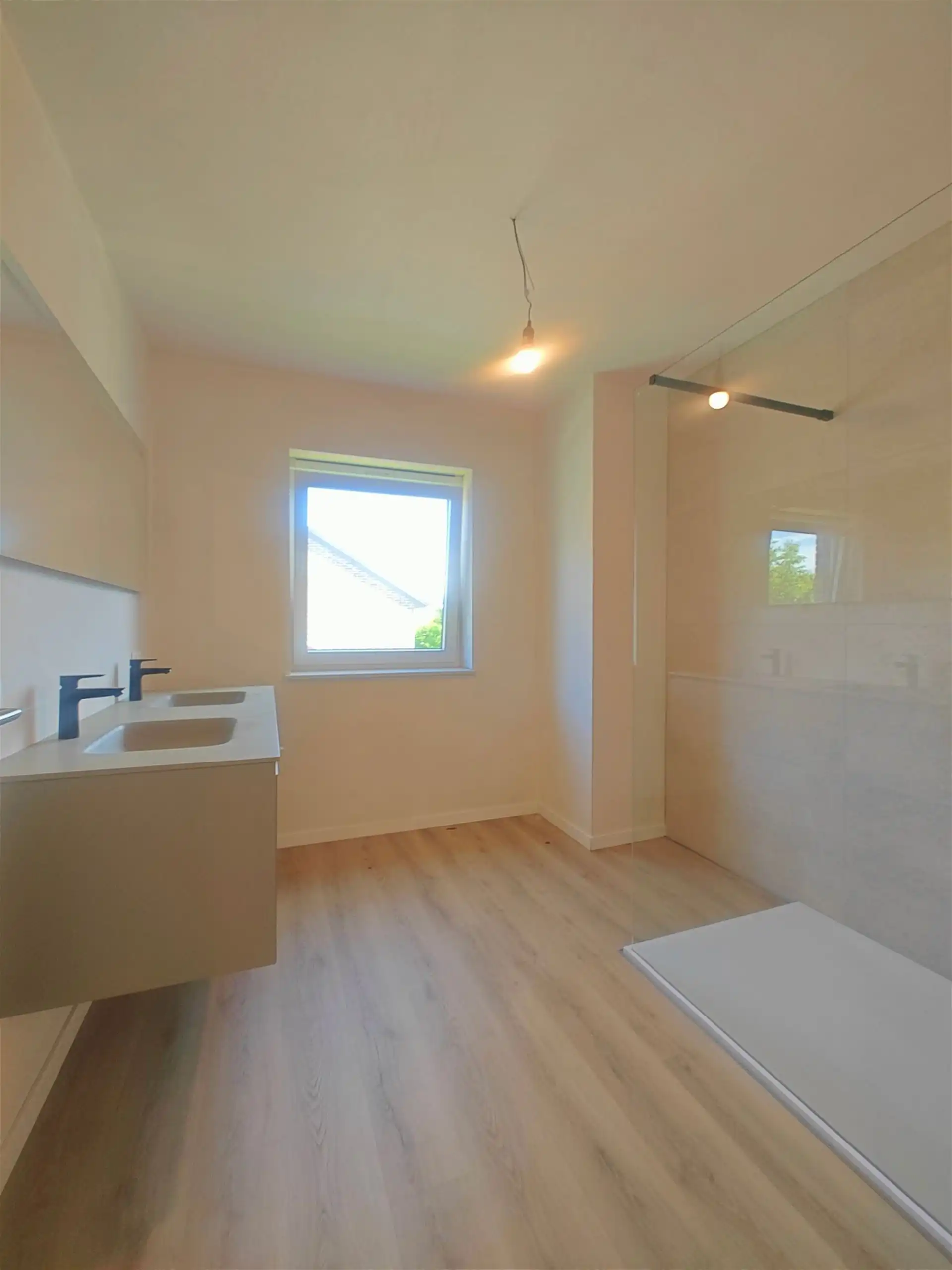 Instapklare nieuwbouwwoning met 3 slaapkamers in een rustige, kindvriendelijke buurt van Maasmechelen. foto 14