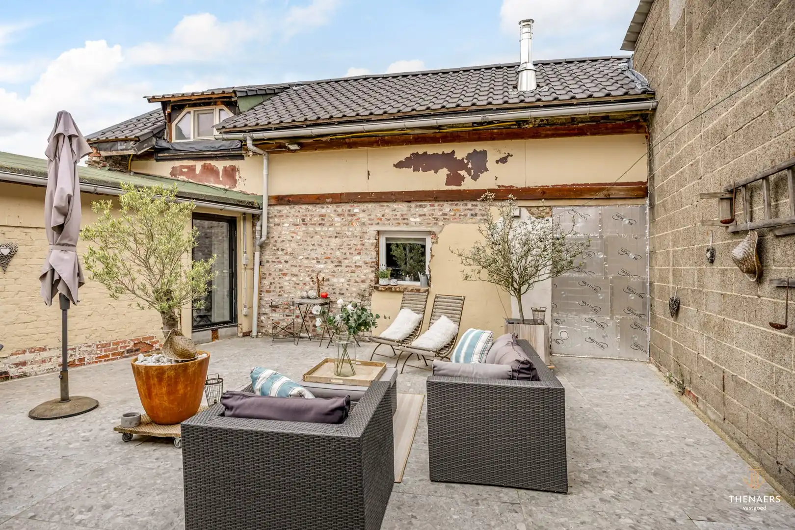 Karaktervolle hoevewoning met 3 slaapkamers, gezellige binnenkoer en tuin op een perceel van 370 m². foto 27