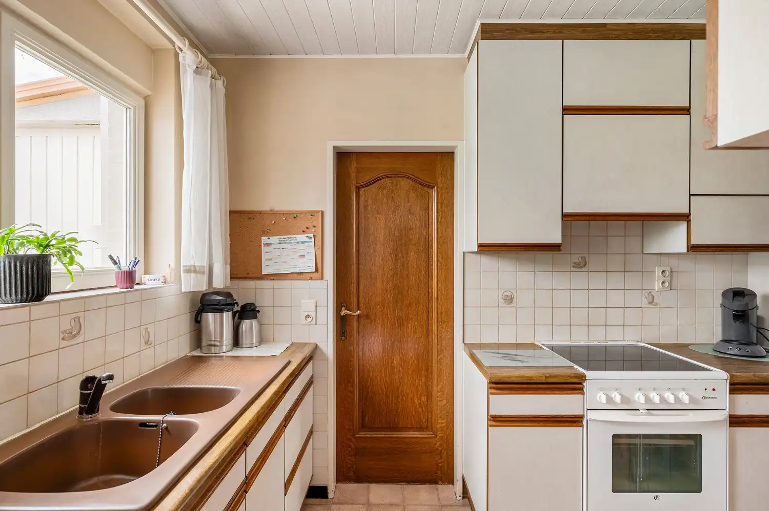 Charmante gezinswoning met 3 slaapkamers, veranda en tuin. foto 10