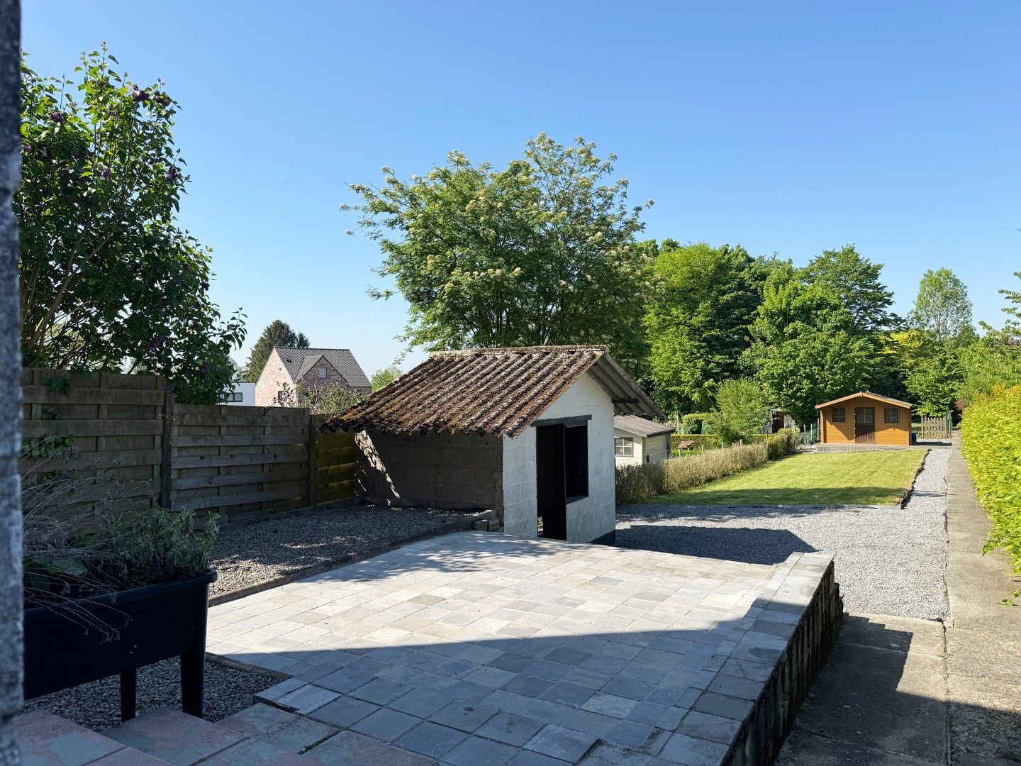 Opbrengsteigendom met potentieel in hartje Borgloon – Tweewoonst met tuin en terras foto 11