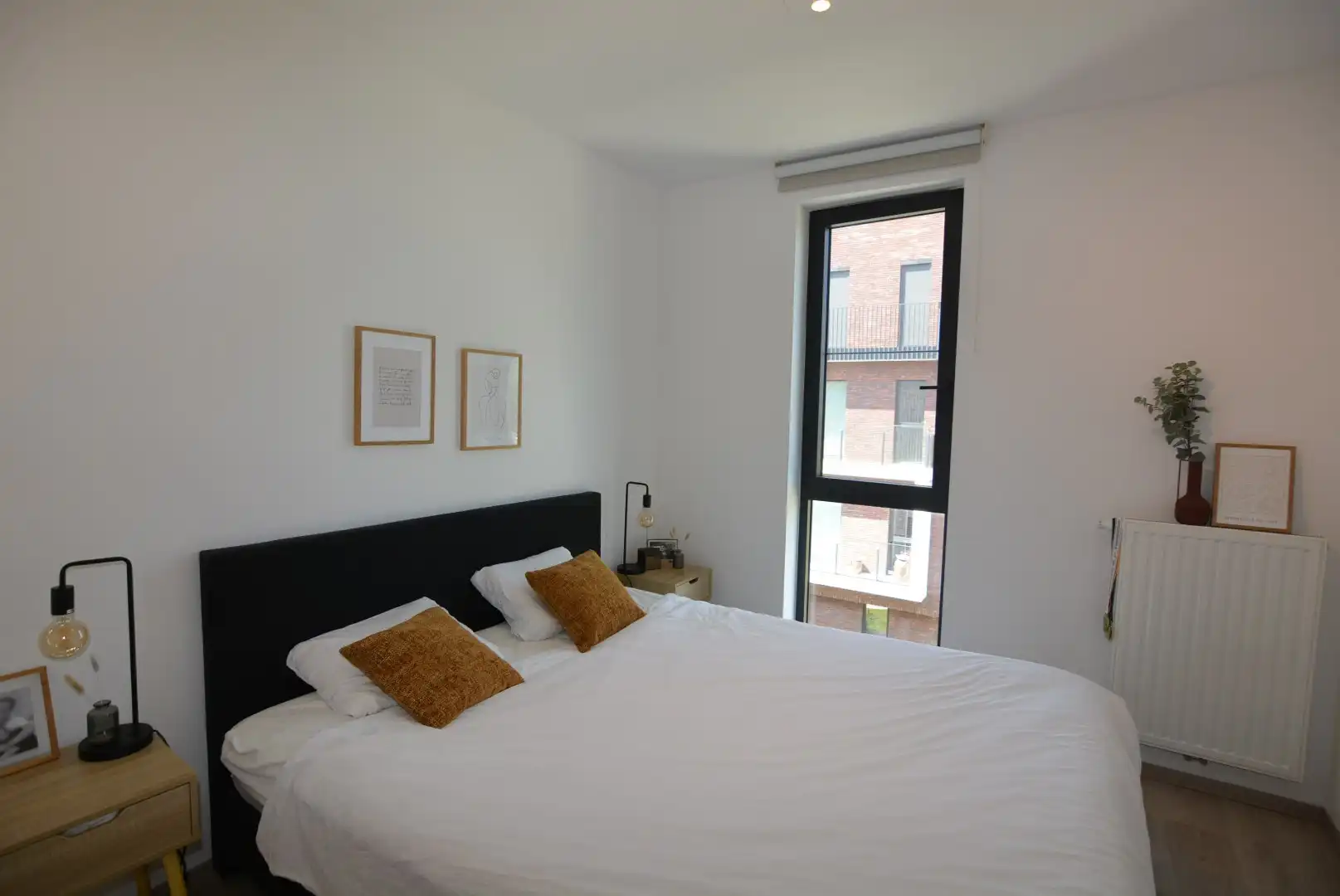 Modern, energiezuinig appartement met 2 slpks, terras, autostaanplaats en kelderberging. foto 14