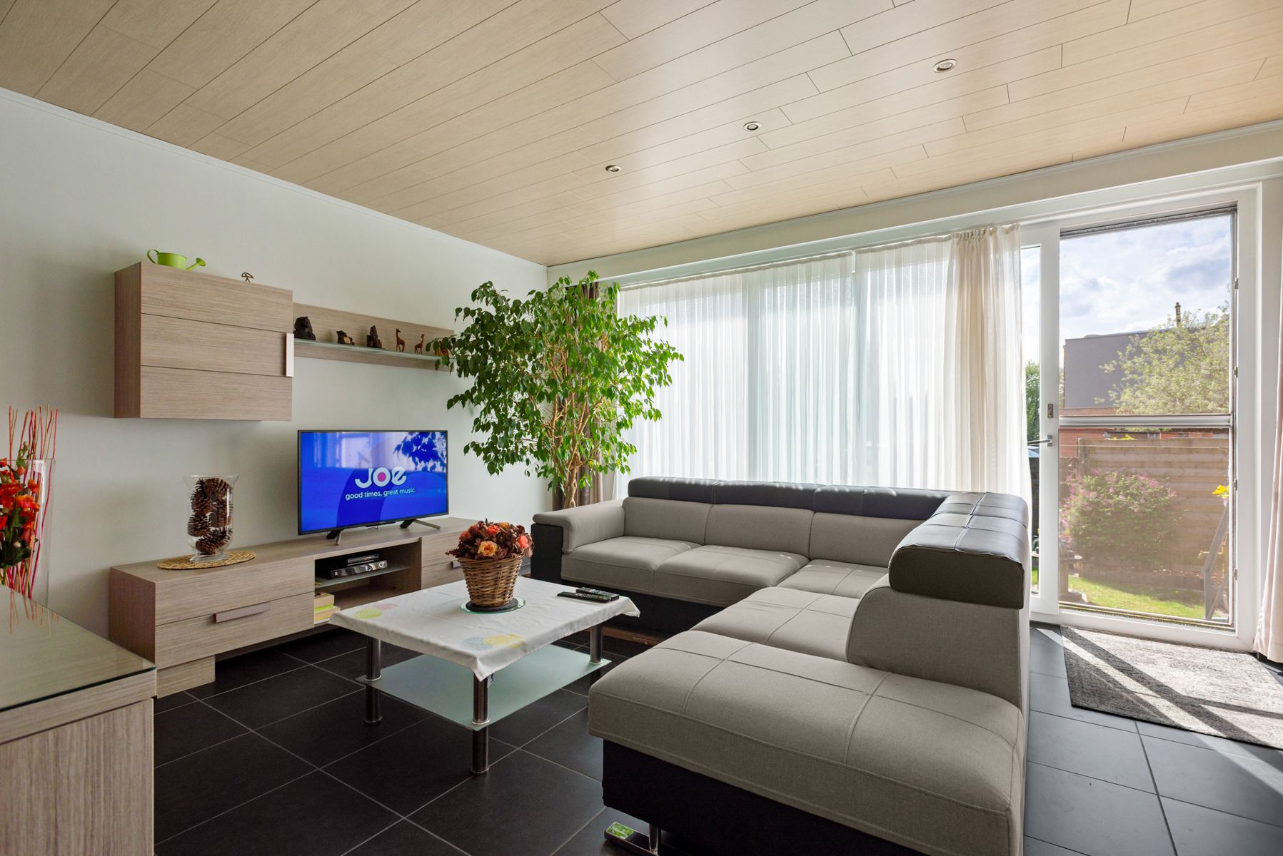 Gelijkvloers appartement met tuin en veelzijdige extra ruimte te Boom foto 3