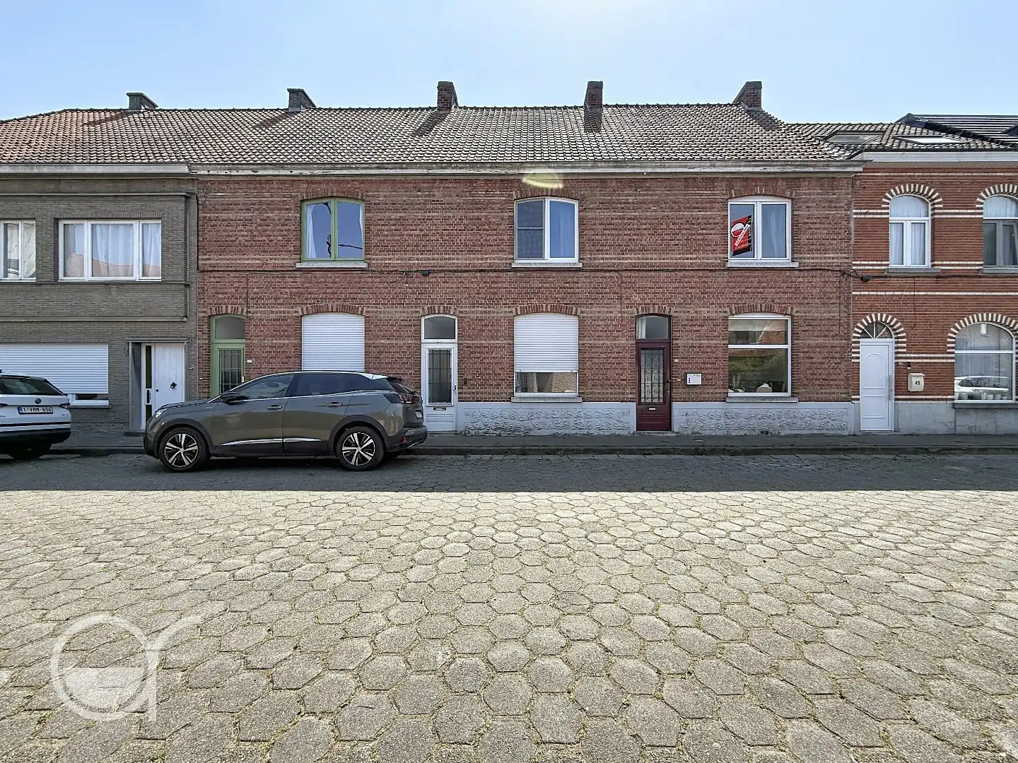 Rijwoning met 2 slaapkamers en zonnig stadstuintje in centrum Drongen foto {{pictureIndex}}