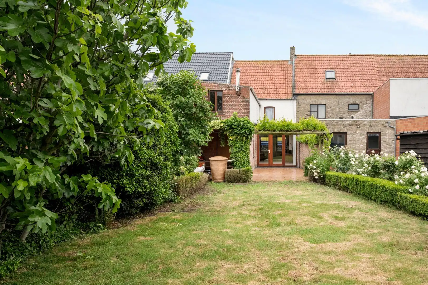 Verrassend ruime woning met 2 slaapkamers en gezellige tuin. foto 21