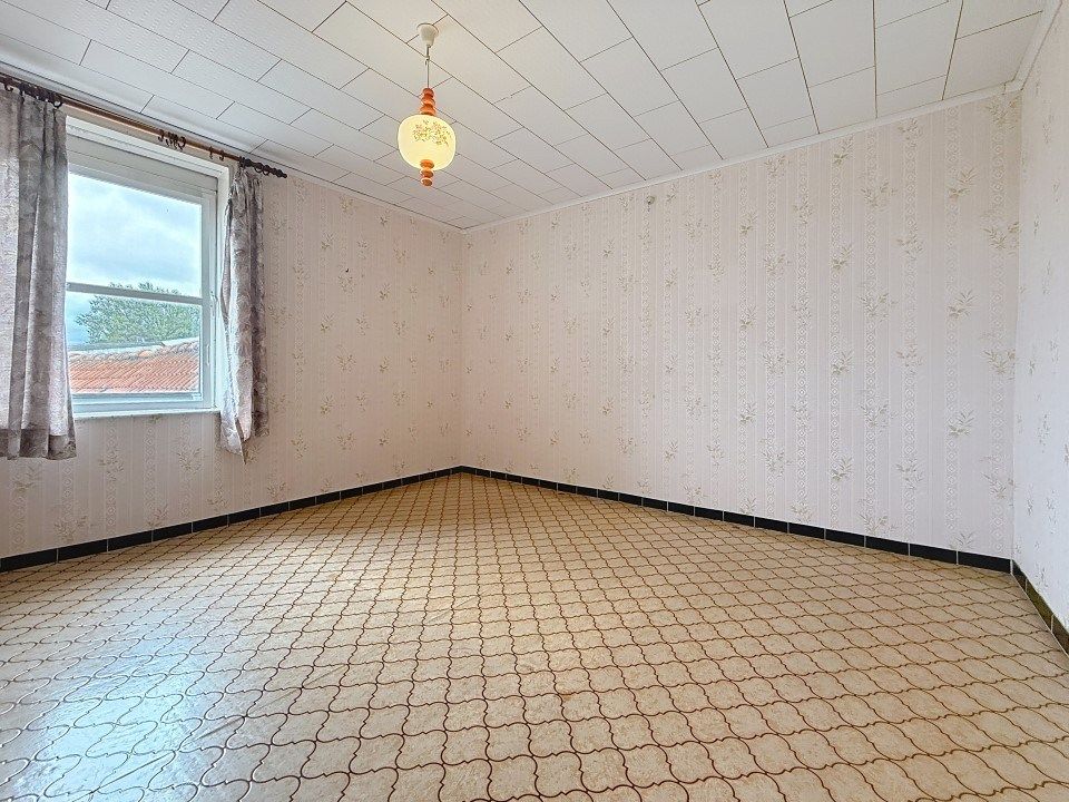 Charmante woning met grote tuin én garage in het centrum van Zarren foto 10