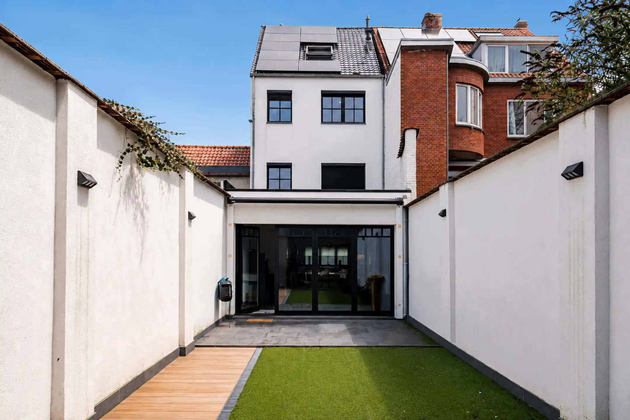 Energiezuinige stadswoning met 4-5 slpks & ZW-tuin foto {{pictureIndex}}