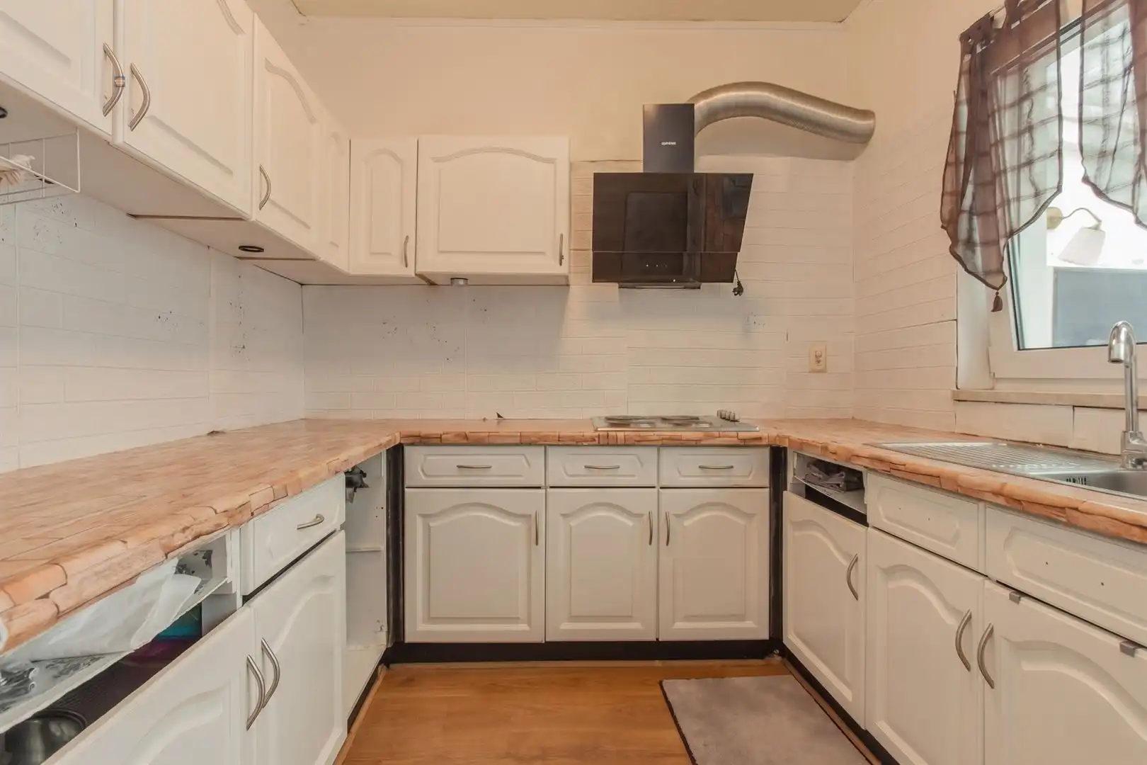 Opbrengsteigendom met handelsruimte en verhuurd duplex appartement in het centrum van Willebroek foto 16