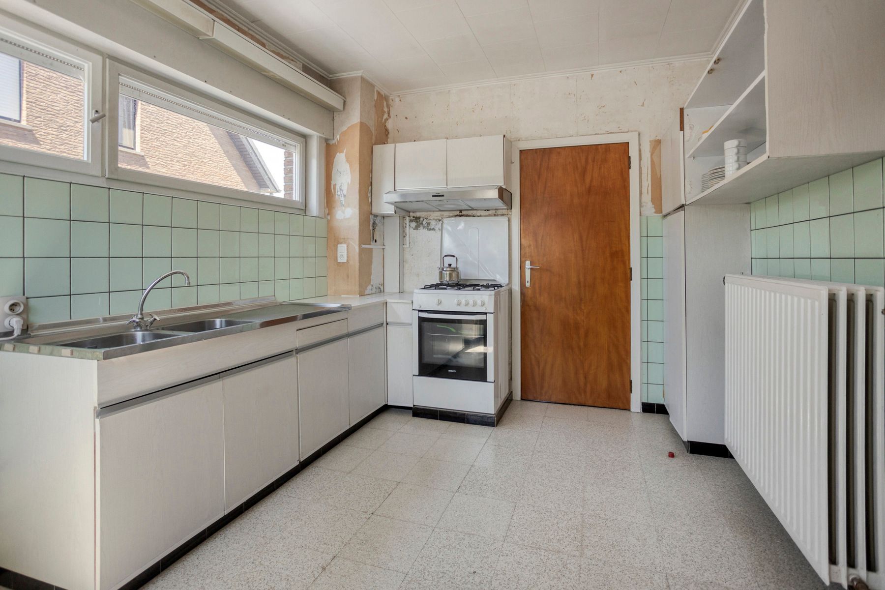 Te renoveren open bebouwing met zuidgerichte tuin foto 8