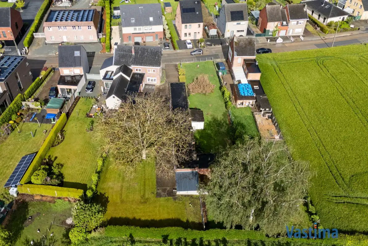 Woning met opslagruimte en grond op strategische ligging foto 33