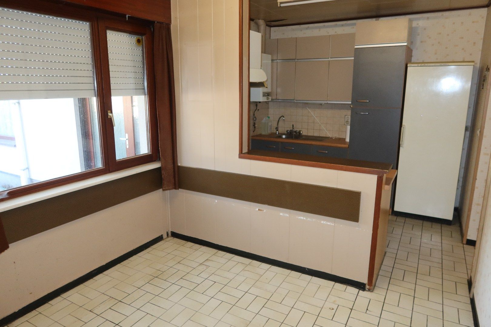 Te renoveren woning met 3 tot 4 slk en tuin foto 8
