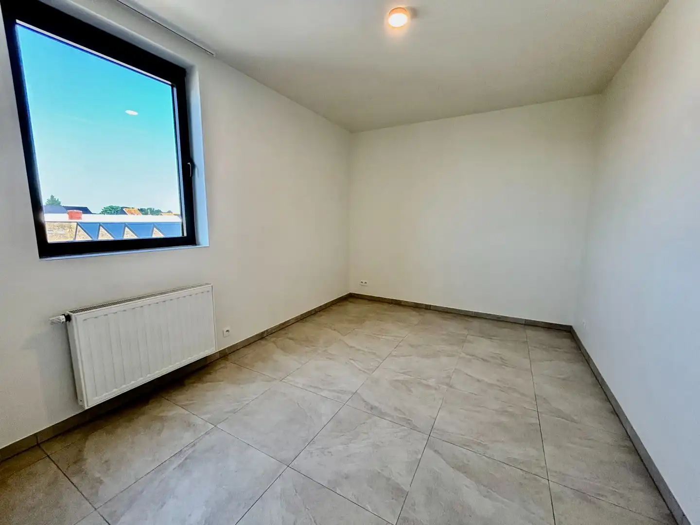 Ruim dakappartement met zonnig terras en garage foto 10