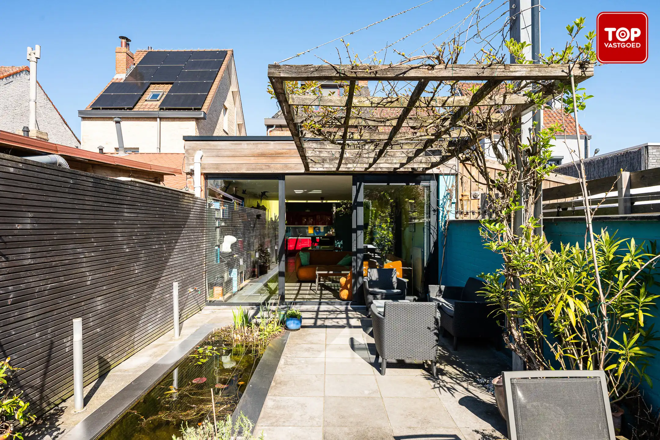 Instapklare woning met 4 slaapkamers, garage en prachtige tuin.  foto 14