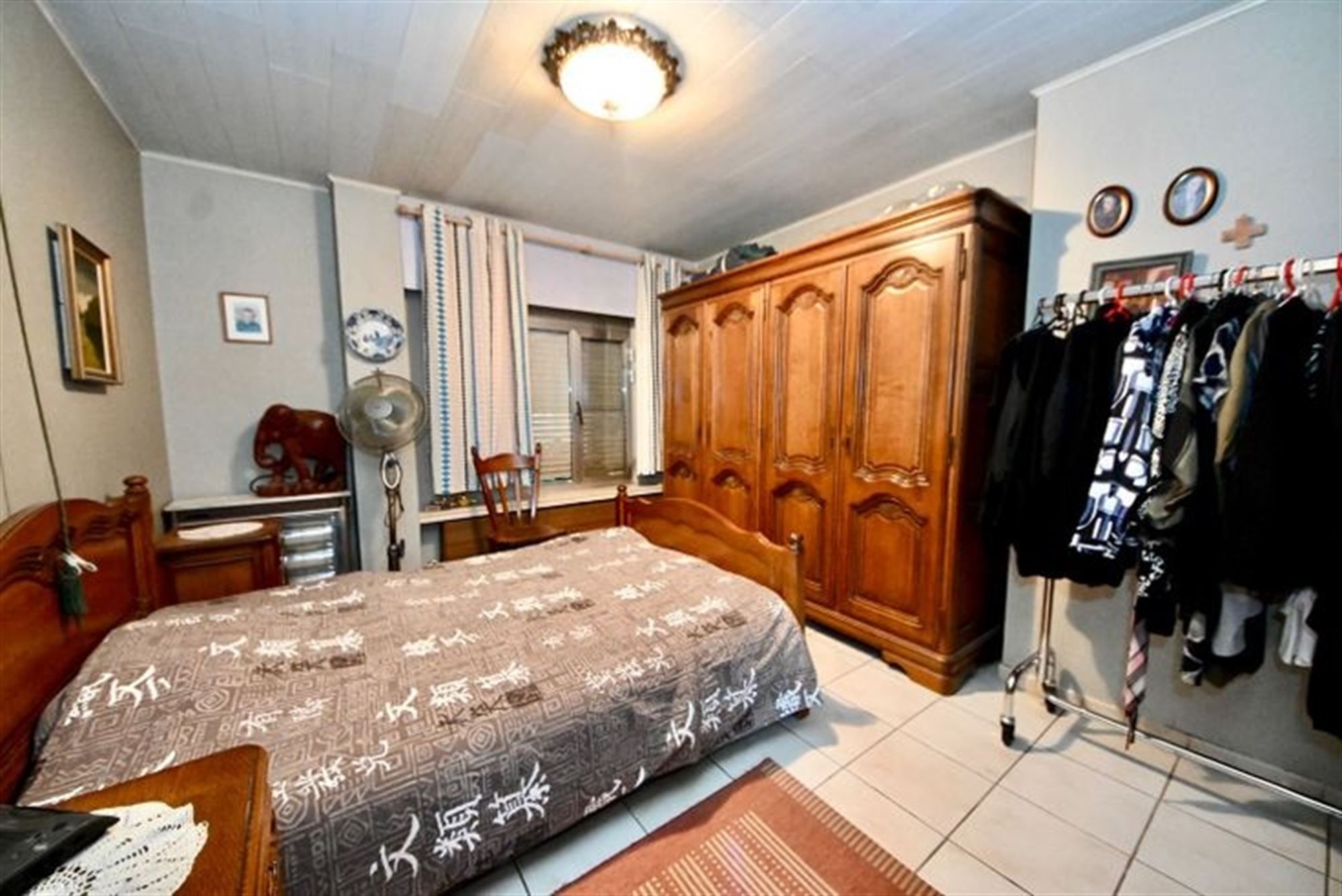Te renoveren laagbouw met 3 slaapkamers, tuin en garage.  foto 12