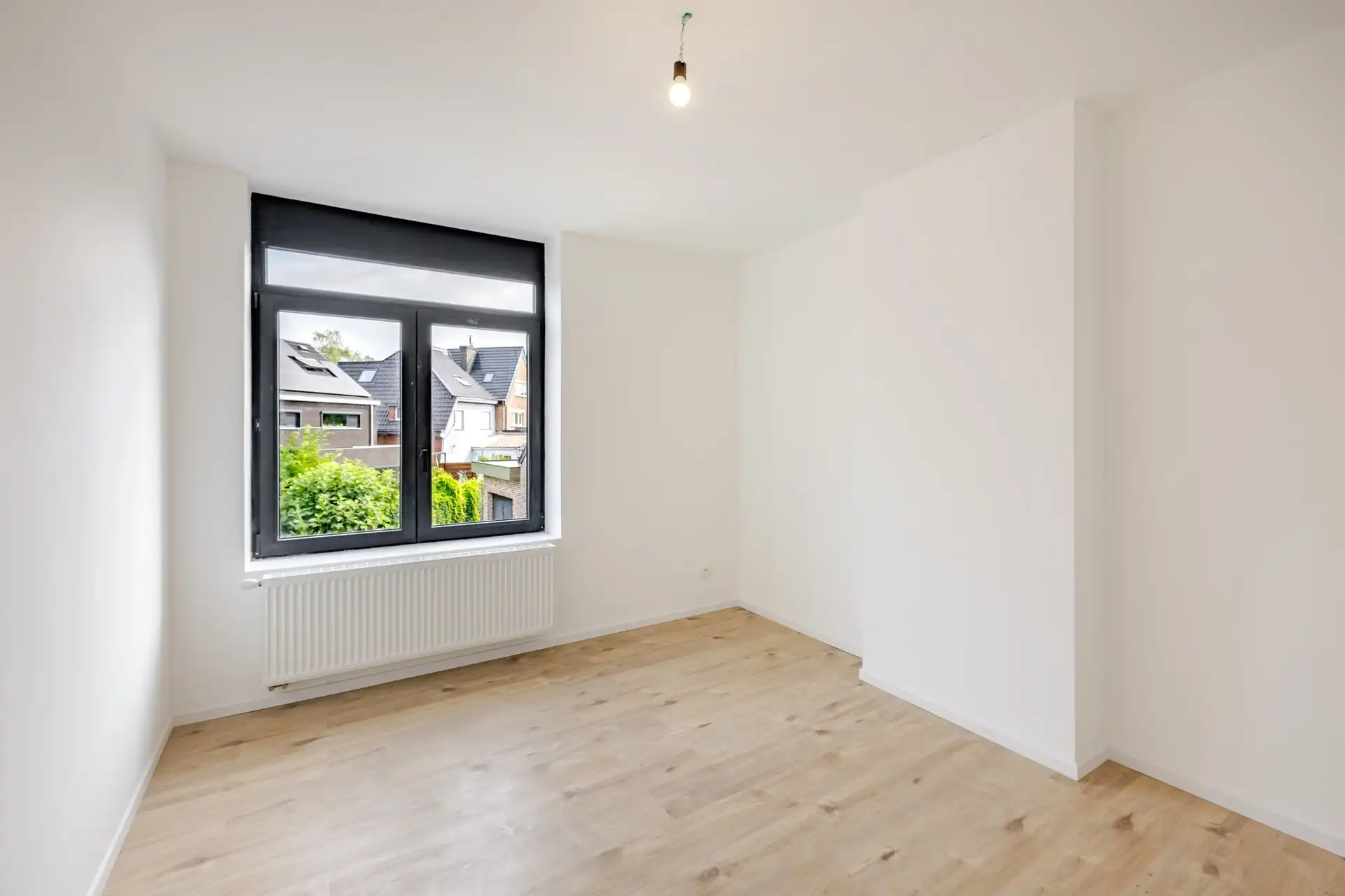 Instapklare, volledig gerenoveerde gezinswoning met 4 slaapkamers, garage en zonnige stadstuin foto 17
