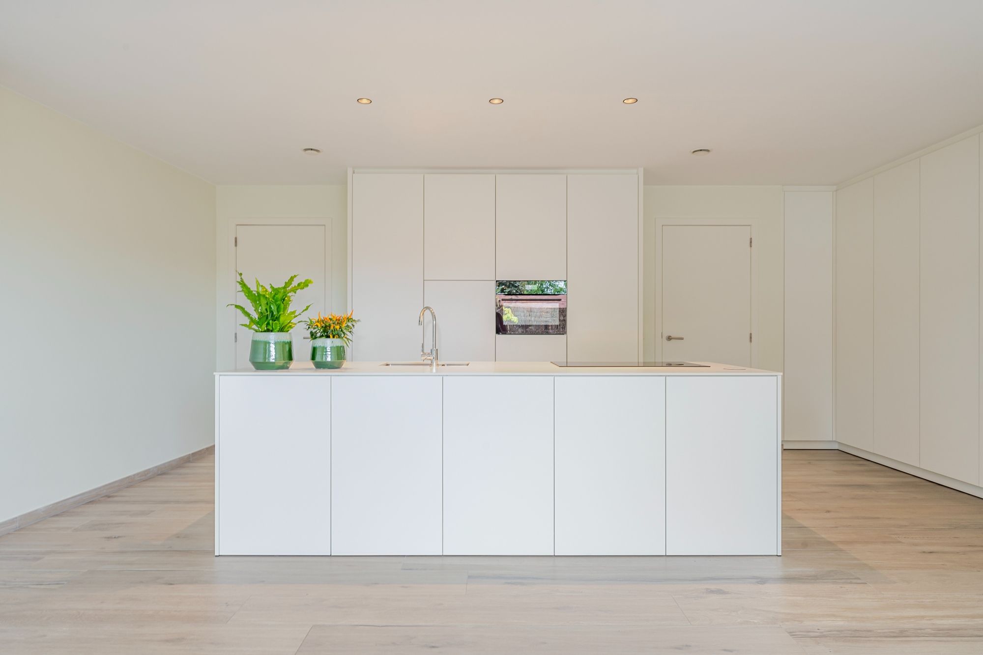 Groot (140m²) gelijkvloers appartement met praktijkruimte, 2 (mog. 3) slaapkamers en ruim terras/koer foto 12