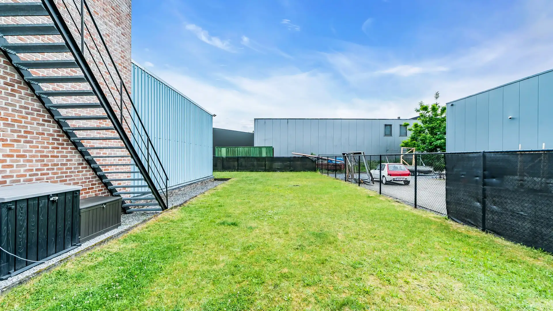Multifunctioneel KMO-pand met magazijn en woongelegenheid te As foto 24