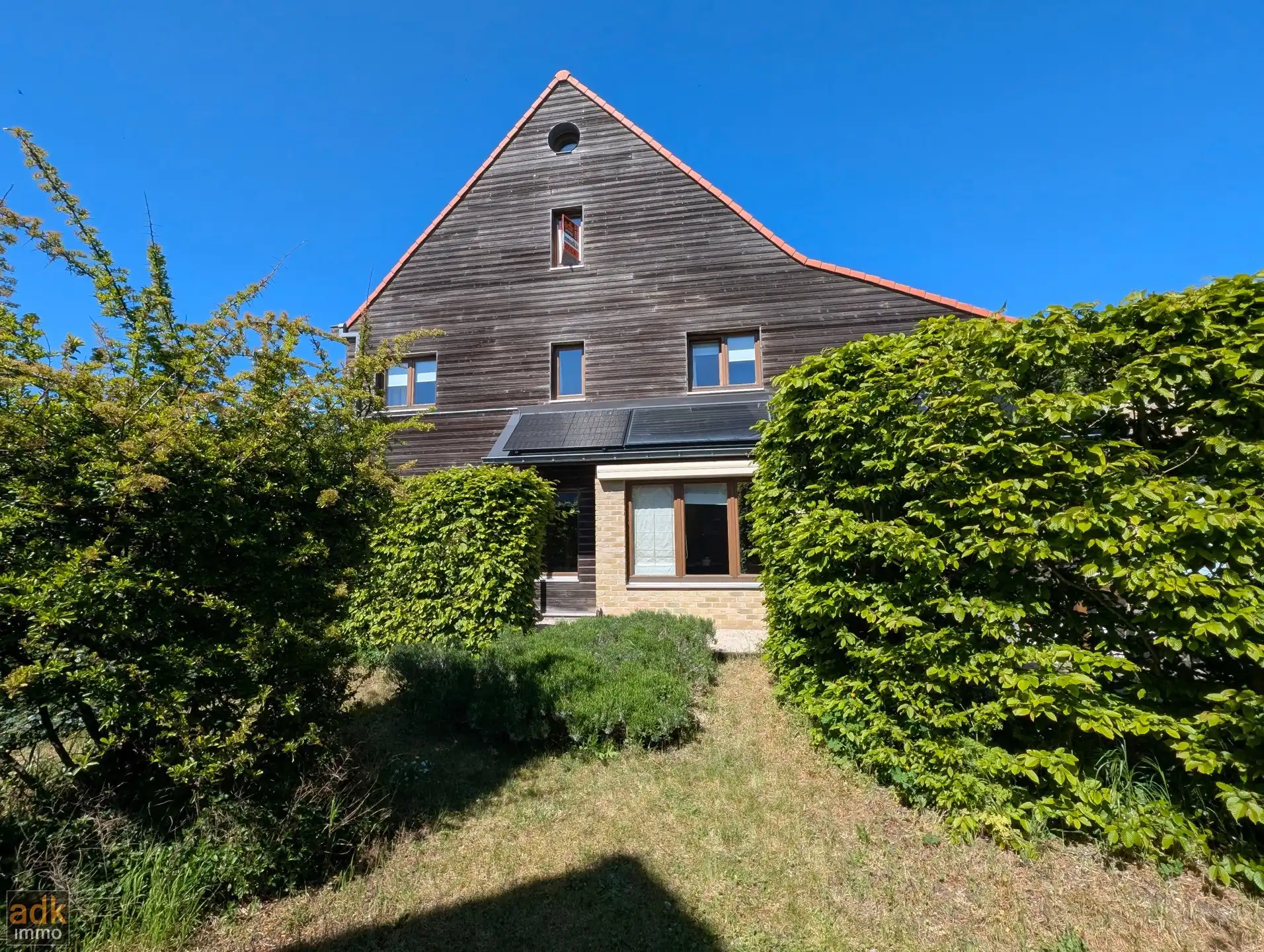 Charmante ecowoning met label A en zonnige tuin, De Panne aan zee.  foto {{pictureIndex}}