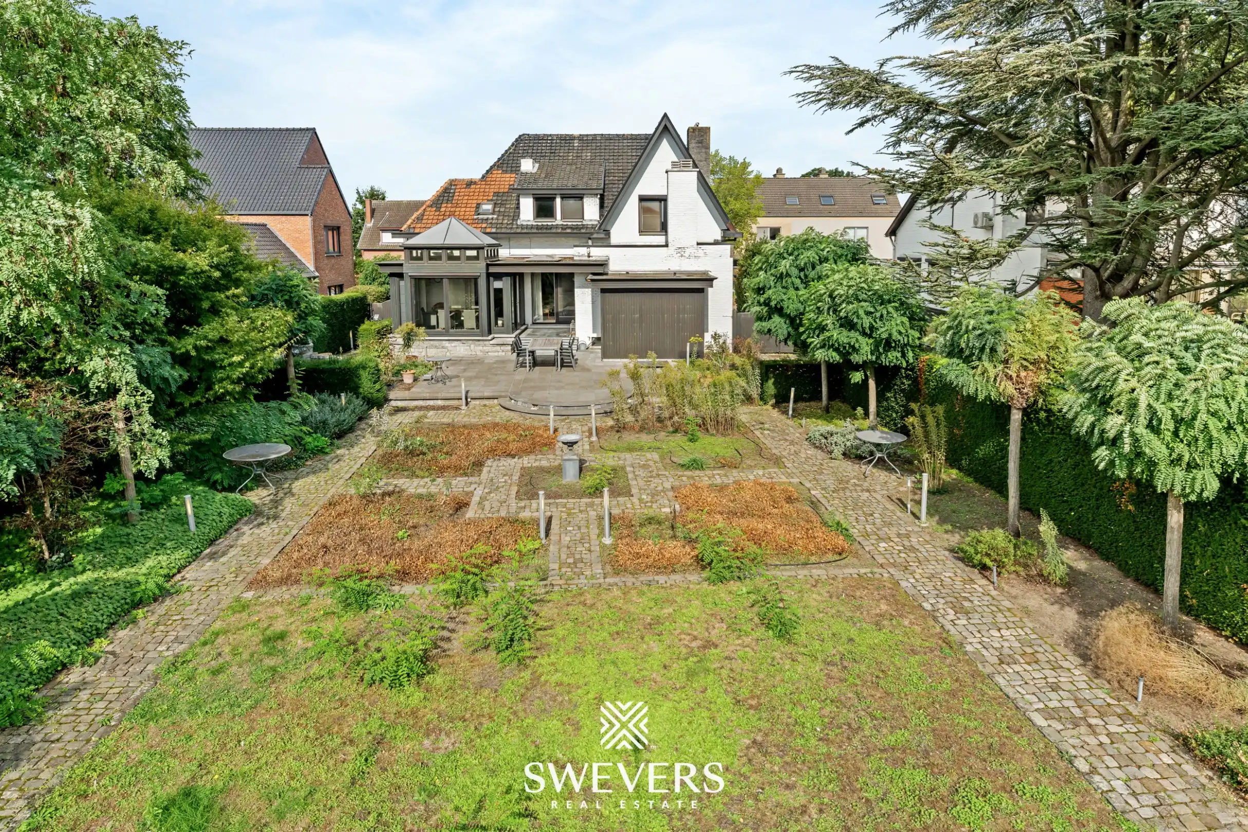 Knappe woning met orangerie, mogelijkheid tot 4 slpk en achterliggende bouwgrond foto 30