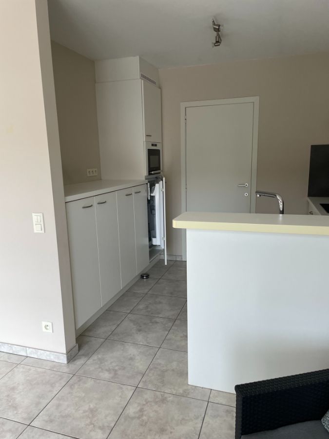 ruim instapklaar twee slaapkamer appartement met groot zongericht terras & gelijkvloerse garage foto 14