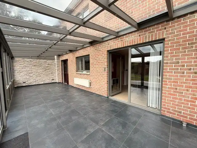 Halfopen woning met 3 slaapkamers, inpandige garage en mooie tuin in Kleine Brogel. foto 27