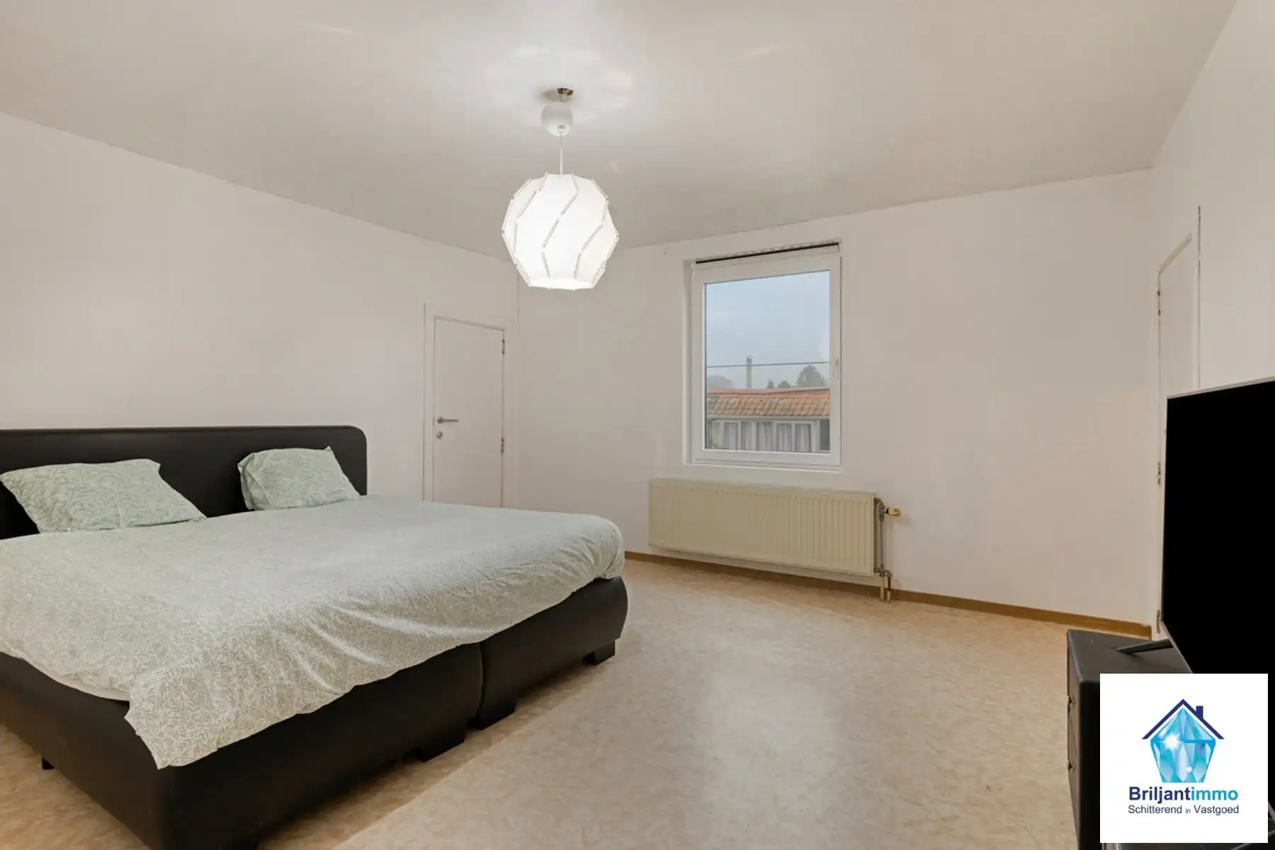 Open bebouwing met 3 slp, garage en tuin in rustige buurt foto 12