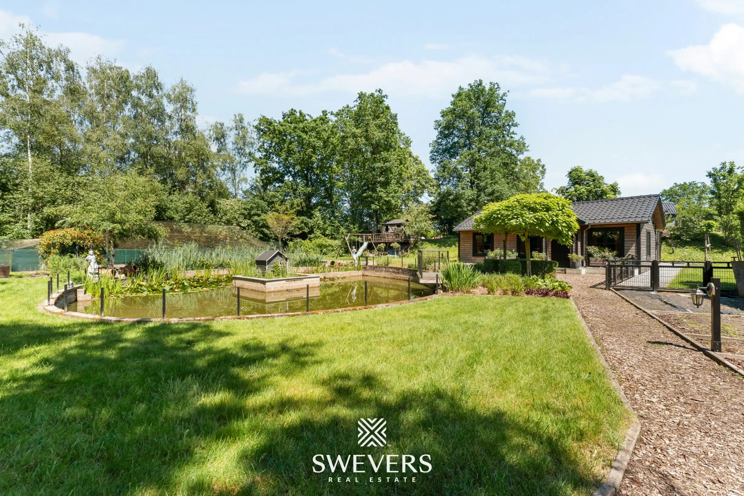 Instapklare open bebouwing met ruime tuin en chalet op 2.364 m² in Houthalen-Helchteren foto 26