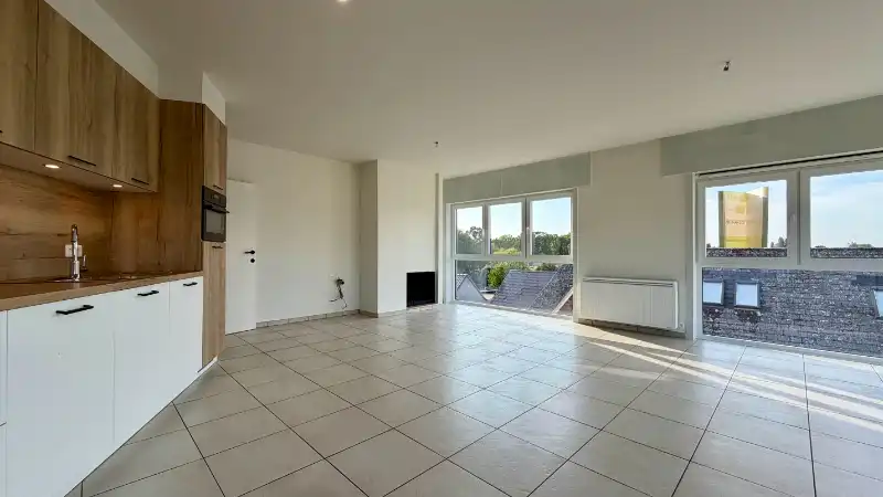 Lichtrijk hoekappartement met 2 slaapkamers en ondergrondse parkeerplaats foto 5
