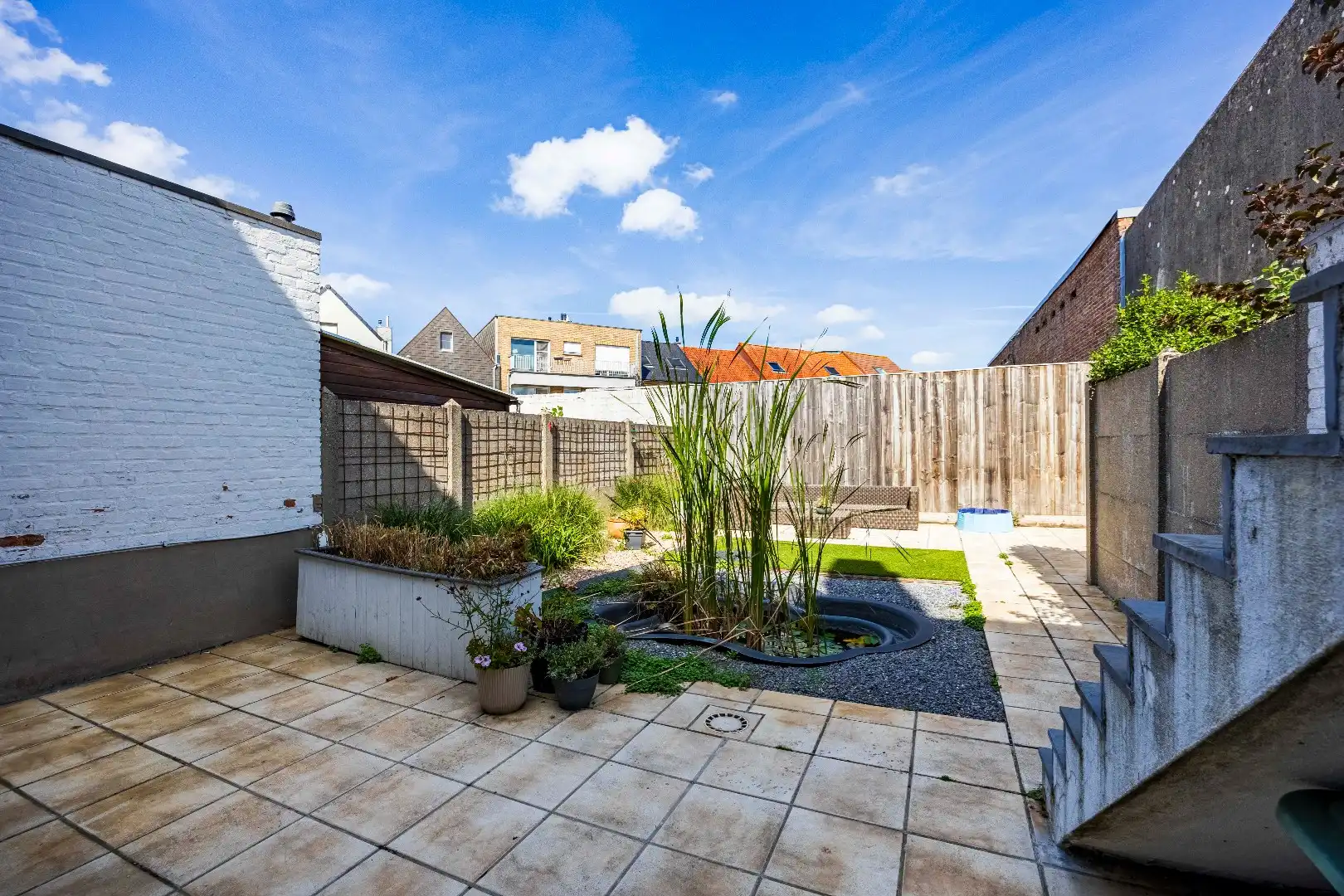 Instapklare bel-etagewoning met garage, zonnepanelen en aangename buitenruimte in het centrum van Heist. foto 17
