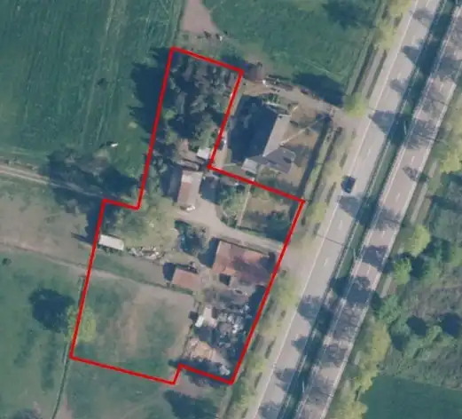 Landelijk gelegen perceel met schuur en bijgebouwen op 4.941 m² foto {{pictureIndex}}