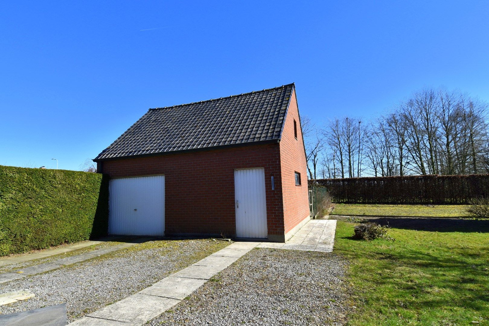 Gezinswoning op een perceel van 1244 m² met 4 slaapkamers, zonnige tuin en dubbele garage te koop in Ooigem/Wielsbeke foto 17