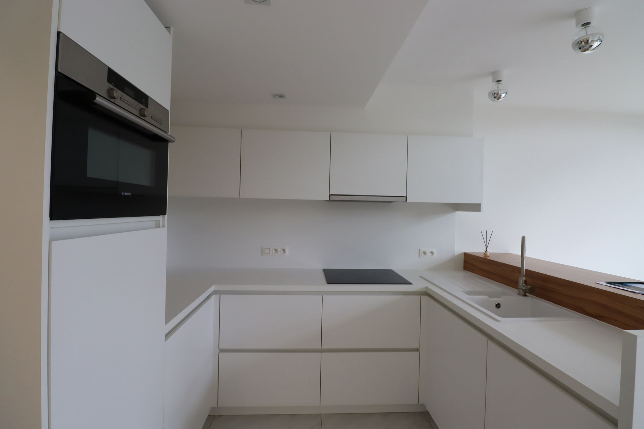 Prachtig gelijkvloersappartement met 2 slaapkamers en garage. foto 12