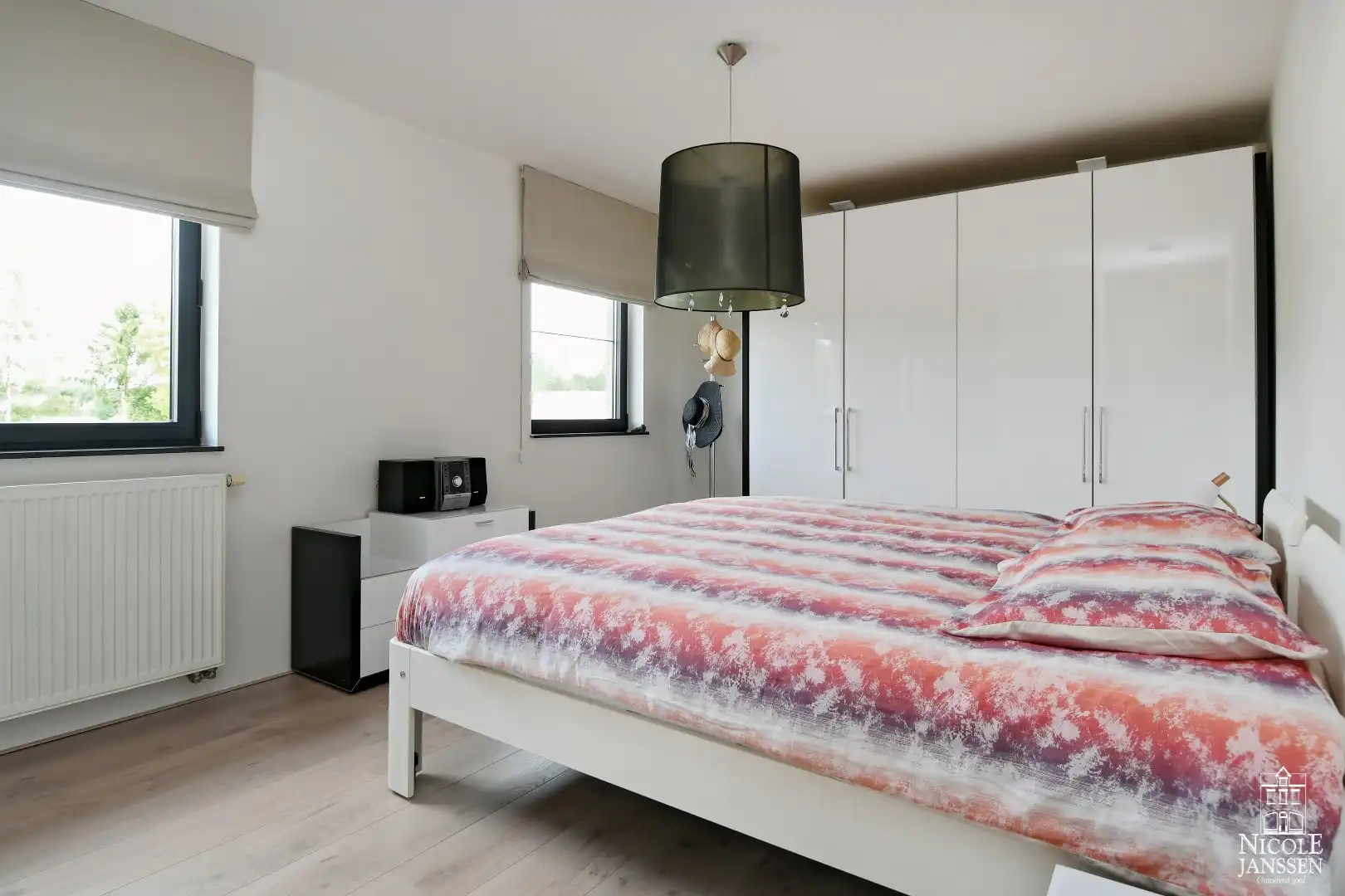 Instapklare goed onderhouden gezinswoning met mooie tuin met gezellig overdekt terras foto 17