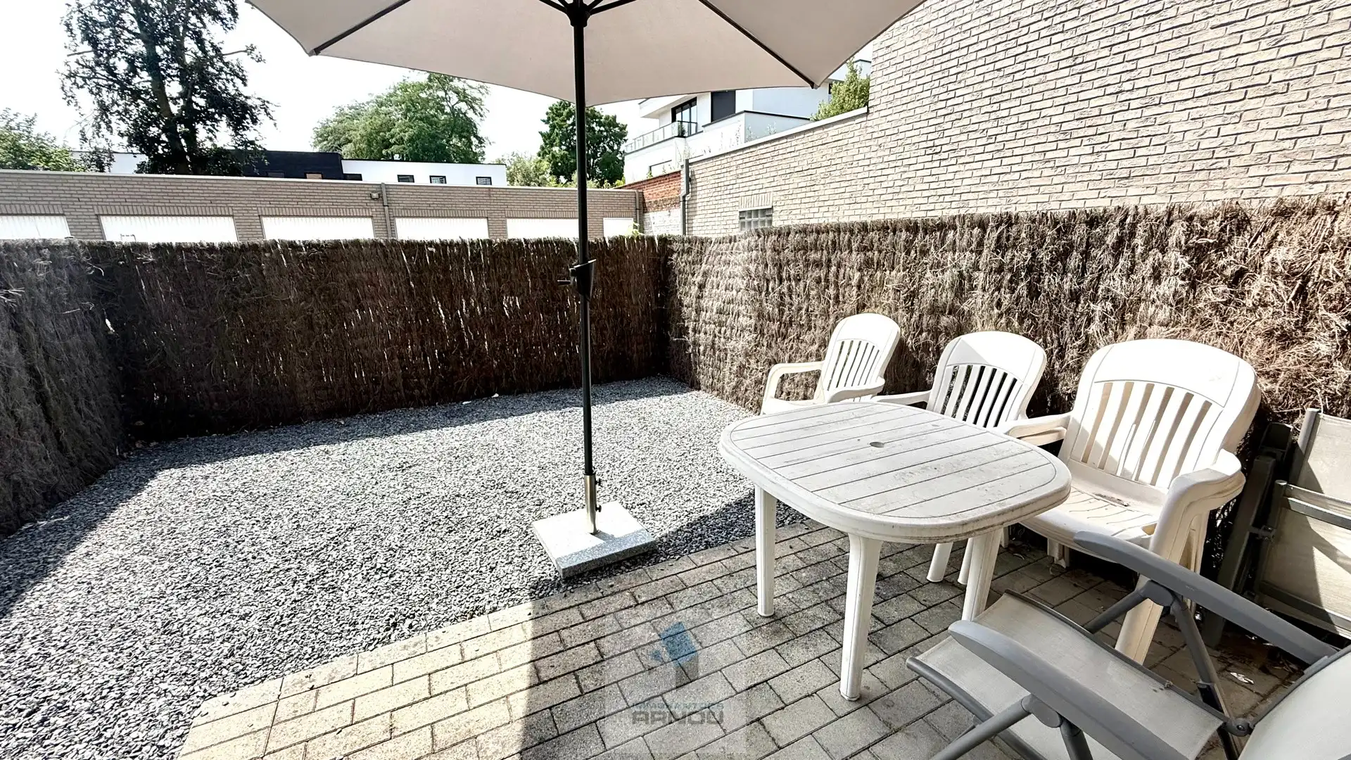 Gezellig gelijkvloers appartement met 1 slaapkamer, stadstuintje en privatieve autostaanplaats foto 14