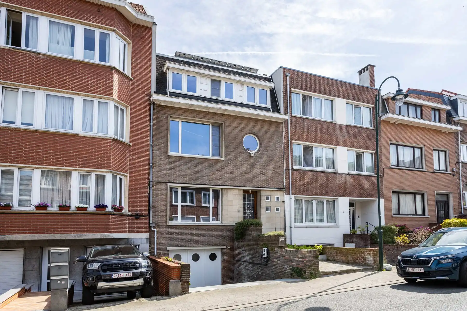 Woning met zuidgerichte tuin en garage in Laken foto 2