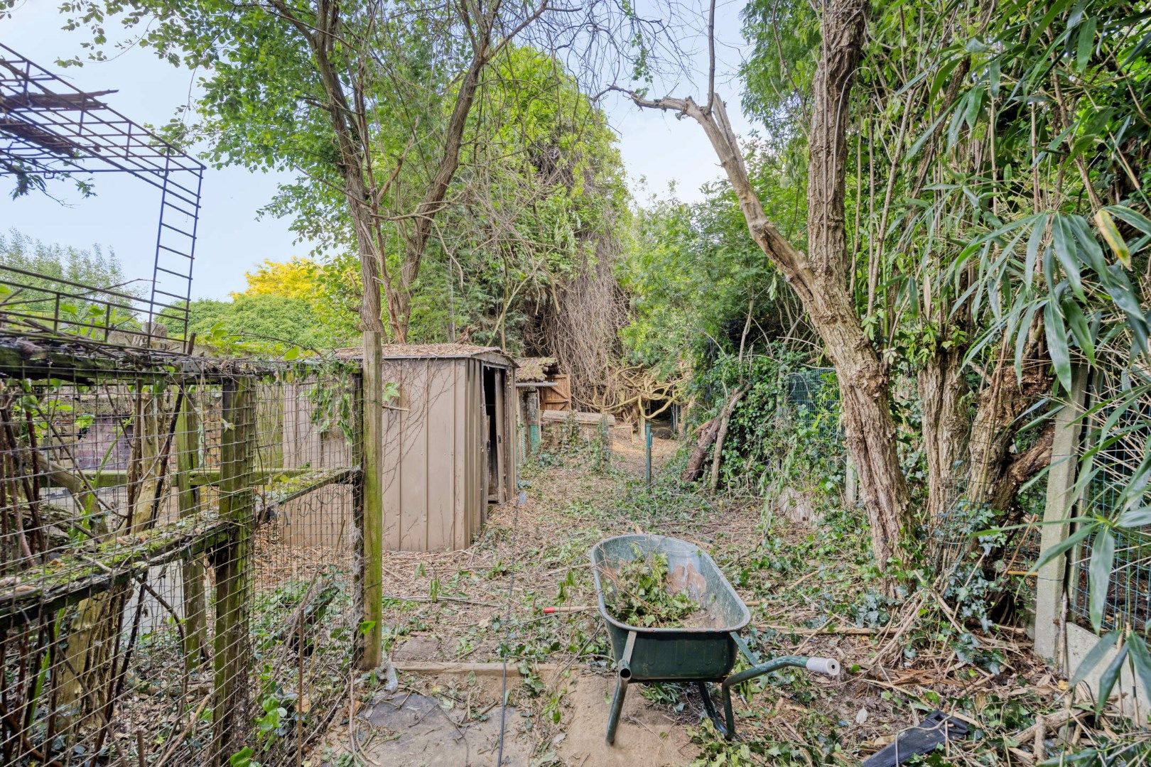 Te renoveren halfopen bebouwing met 3 slaapkamers en ruime tuin in hartje Kessel-Lo  foto 17